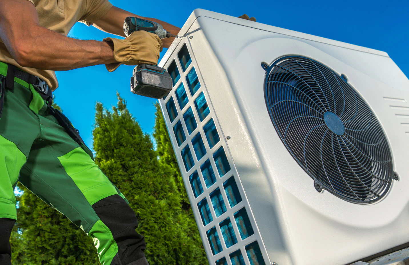 hvac technician opening the cover of heat pump 1